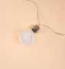 A single LED light bulb string light on a plain background. Produktbild-Vorschau