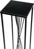 A black metal plant stand with a square top and a unique twisted base. Voir les images du produit