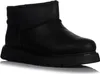 A black boot is shown from the side against a white background. Voir les images du produit