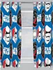 A pair of Star Wars themed curtains hanging in front of a window. Voir les images du produit