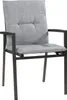A studio shot of a single gray armchair with cushions. Produktbild-Vorschau