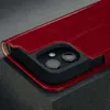 A close-up shot of a red leather phone case, showing the camera cutout and the edge of the case. Anteprima dell’immagine prodotto