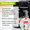 A coffee machine with a bottle of descaler in the foreground. Produktbild-Vorschau