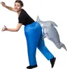 A woman wearing an inflatable shark costume. Produktbild-Vorschau