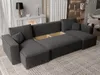 A modern sectional sofa with storage compartments open, displayed in a living room setting. Voir les images du produit