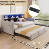 A daybed with a pull-out trundle bed, set up in a bedroom with a window view. Voir les images du produit