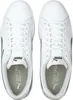 A top-down view of a pair of white Puma sneakers. Podgląd zdjęcia produktu