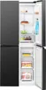 The inside of an open refrigerator with food items on the shelves. Produktbild-Vorschau
