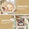 A collage of two images showing different features of a cat tree. The top image shows a cat in a rotating basket, and the bottom image shows a cat peeking out of a tree-trunk-shaped hideaway. Produktbild-Vorschau
