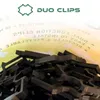 A pile of black clips with text overlayed on a gradient background. Podgląd zdjęcia produktu