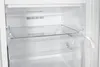 Interior view of an empty refrigerator with clear plastic shelves and drawers. Produktbild-Vorschau