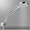 A chrome-plated handheld showerhead with water spraying from it, against a gray background. Voir les images du produit