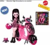 A Monster High doll named Draculaura with her pink scooter, along with a smaller bat accessory and a packaged version of the toy. Podgląd zdjęcia produktu