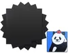 A stack of black square sheets and a separate image of a cartoon panda with an apple on its head. Voir les images du produit
