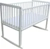 A white wooden baby crib with a mattress inside, shown on a white background. Produktbild-Vorschau