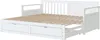 A white daybed with a slatted mattress base and two drawers underneath, shown from a diagonal angle. Náhled obrázku produktu