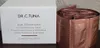 A box of Dr. C. Tuna Age Reversist Instant Perfecting Cream and a roll of individual sachets of the cream. Náhľad obrázku produktu