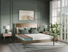 A bedroom scene with a cutaway mattress on a bed, showcasing its internal structure. Produktbild-Vorschau