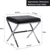 A product image showing a black upholstered stool with a silver metal frame, with dimensions and maximum load capacity indicated by text and lines. Náhled obrázku produktu