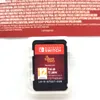 A Nintendo Switch game cartridge is shown in its plastic case against a white background. Produktbild-Vorschau