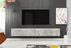 A modern living room with a wall-mounted TV and entertainment unit. Produktbild-Vorschau