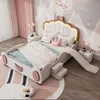A child's bedroom with a car-themed bed, complete with a slide and stairs. Podgląd zdjęcia produktu