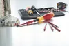 A set of electrical tools and components laid out on a metallic surface. Náhľad obrázku produktu