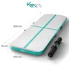 A white and mint green airtrack mat with teal lines, shown with a black carrying bag. Produktbild-Vorschau