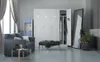 A locker room or changing area with lockers, a sofa, a water cooler, and a mirror. Podgląd zdjęcia produktu