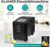 A black KLAMER ice maker is shown on a countertop, with a glass of ice and lime, a scoop of ice, and a recipe book. Produktbild-Vorschau