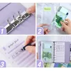 A collage of four images showing different aspects of a purple binder notebook with budget envelopes and sheets. Voir les images du produit