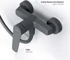 A dark gray shower faucet mounted on a white wall, with measurement lines and text indicating dimensions. Produktbild-Vorschau