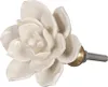 A single white ceramic flower knob with a metallic stem and connector. Produktbild-Vorschau
