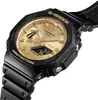 Close-up studio shot of a black and gold G-Shock watch. Náhľad obrázku produktu