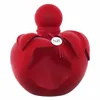 A red perfume bottle shaped like an apple. Voir les images du produit
