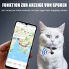 A white cat wearing a collar with a tracking device, next to a smartphone displaying a map with a route. Produktbild-Vorschau