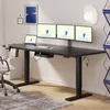 A modern home office setup with a black standing desk, multiple monitors, and a laptop. Voir les images du produit