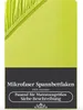 A close-up of a green fitted sheet with elasticated edges, with text overlay describing the product. Produktbild-Vorschau