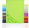 A folded green fitted sheet is shown, with a stack of fitted sheets in various colors to the left and right. Produktbild-Vorschau