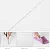 Collage of images showing product features: a hand using scissors on a surface, water droplets on a surface, and a hand wiping a surface with a cloth. Produktbild-Vorschau