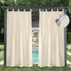 Outdoor curtains hanging on a pergola next to a swimming pool. Anteprima dell’immagine prodotto
