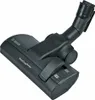A black vacuum cleaner floor head attachment is shown against a white background. Voir les images du produit