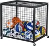 A black metal ball cage filled with various sports balls, including basketballs, soccer balls, and volleyballs, on a light gray background. Produktbild-Vorschau
