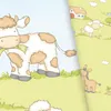 A cartoon illustration of a farm scene with a cow, a lamb, and a foal. The image is split, with the cow on the left and the other animals and a house on the right. Produktbild-Vorschau