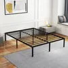 A black metal bed frame is shown in a bedroom setting. Náhľad obrázku produktu