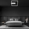 A modern bedroom with a bed and a ceiling light. Produktbild-Vorschau