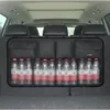 The back of a car with an organizer filled with water bottles. Podgląd zdjęcia produktu