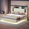 A bedroom scene featuring a bed with integrated storage and lighting. Produktbild-Vorschau