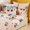 A child's bed with pink bedding featuring a sloth and palm tree pattern, along with stuffed animals. Produktbild-Vorschau