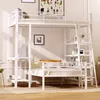 A white metal loft bed with shelves and a ladder, set up in a room. Produktbild-Vorschau